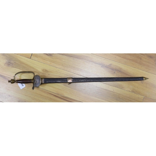 277 - An 18th century European brass hilted sword and scabbard. 89cm long