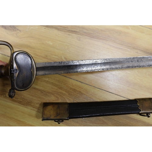 277 - An 18th century European brass hilted sword and scabbard. 89cm long