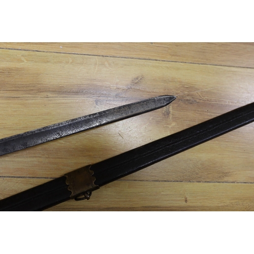 277 - An 18th century European brass hilted sword and scabbard. 89cm long