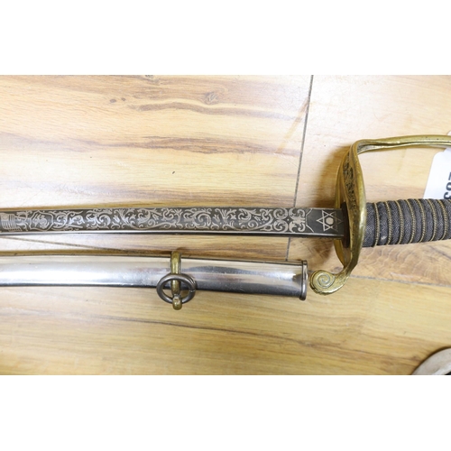 283 - A United States Marines dress sword made by Wilkinson, the blade etched S/SGT. JAMES P.S. DEVEREUX ... 