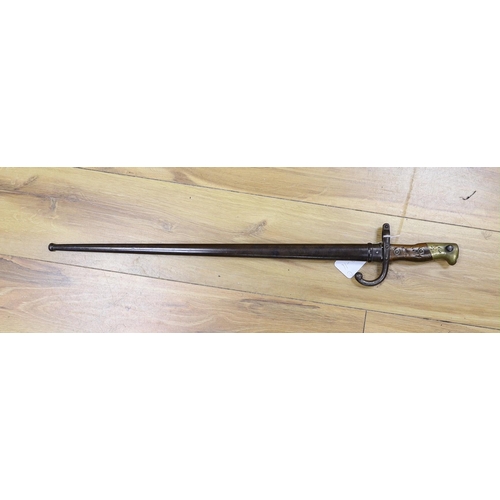 284 - A Victorian officer's sword, lacking sheath, together with a 19th century French 1877 bayonet and ... 