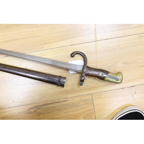 284 - A Victorian officer's sword, lacking sheath, together with a 19th century French 1877 bayonet and ... 