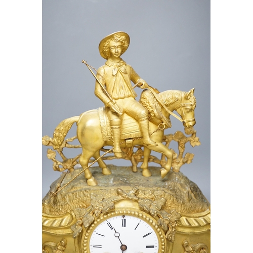 285 - A Louis XV style gilt metal cased eight day mantel clock, 37cm tall