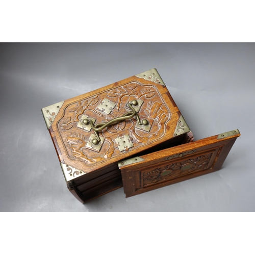 287 - An early 20th century Chinese hardwood cased bone and bamboo mahjong set