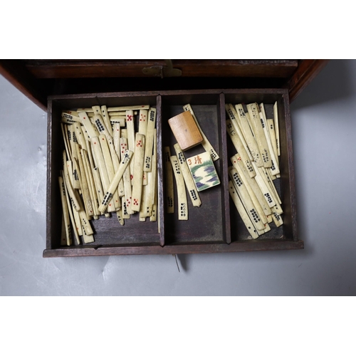 287 - An early 20th century Chinese hardwood cased bone and bamboo mahjong set