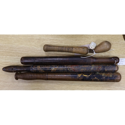 294 - Four 19th century treen truncheons, longest 46cm