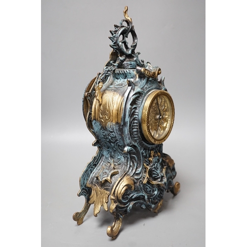 295 - A Louis XV style spelter and parcel gilt mantel timepiece, 37cm