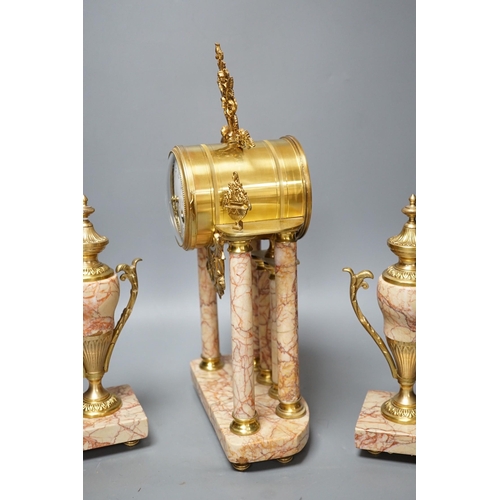 299 - A French gilt metal and marble clock garniture, 38cm