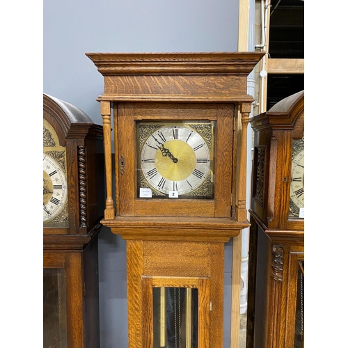 3 - An oak longcase clock, with a square brass and silvered dial, height 203cm