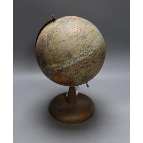 302 - A Geographia 8 inch terrestrial globe. 31cm tall