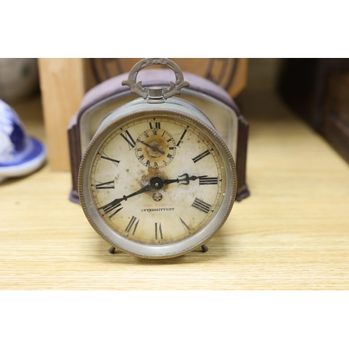 321 - A Black Forest cuckoo clock, together with another octagonal faced timepiece, a Bakelite timepiece a... 