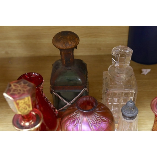 323 - A pair of Bohemian gilded ruby glass decanters and stoppers, a Bohemian millefiori paperweight sto... 