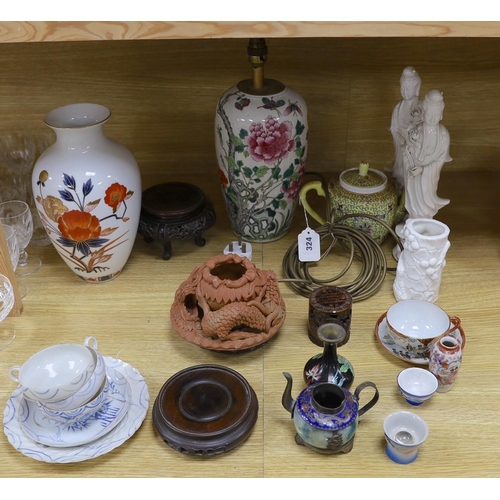 324 - A late 19th century Chinese famille rose lamp (cut down) and other Chinese and Japanese ceramics and... 