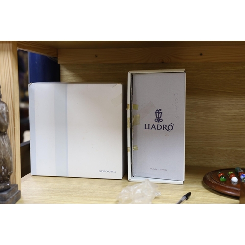 330 - A boxed Lladro figure and another