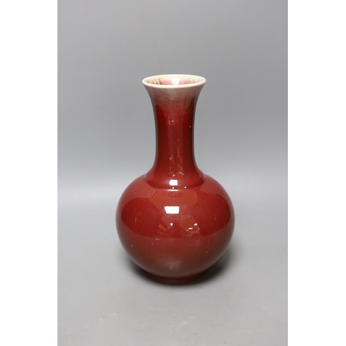 332 - A Chinese ox blood bottle vase, mark to base 27cm