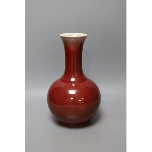 332 - A Chinese ox blood bottle vase, mark to base 27cm