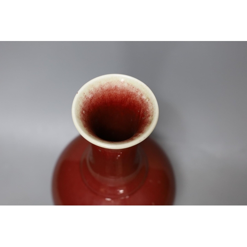 332 - A Chinese ox blood bottle vase, mark to base 27cm