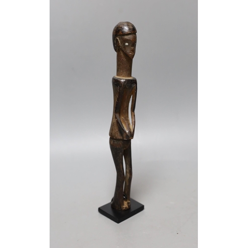 333 - A West African figural carving on stand, 25cm excl stand