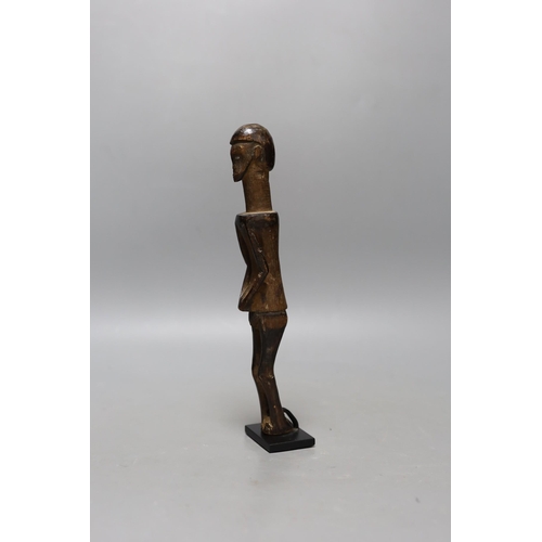 333 - A West African figural carving on stand, 25cm excl stand