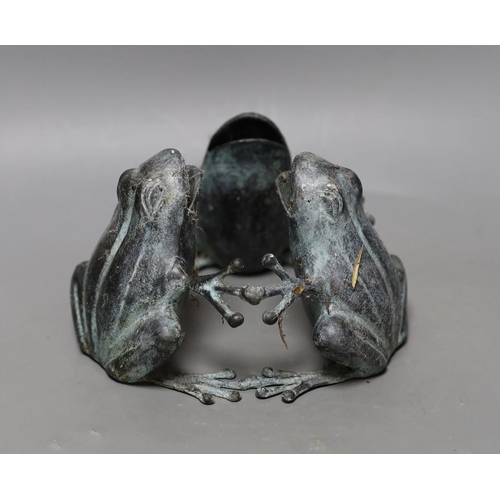 336 - A bronze trio of frogs, 10cm tall