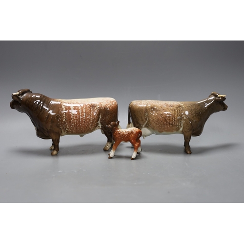 340 - A Beswick Lord Oxford model of a bull, cow and calf