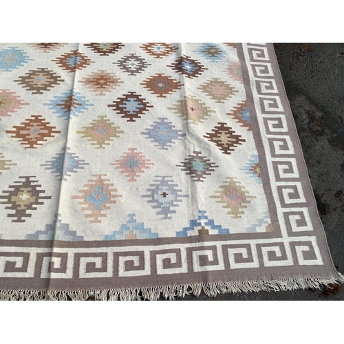 35 - A Kilim Dhurrie polychrome flatweave carpet, approximately 360 x 280cm