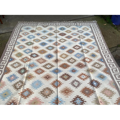 35 - A Kilim Dhurrie polychrome flatweave carpet, approximately 360 x 280cm