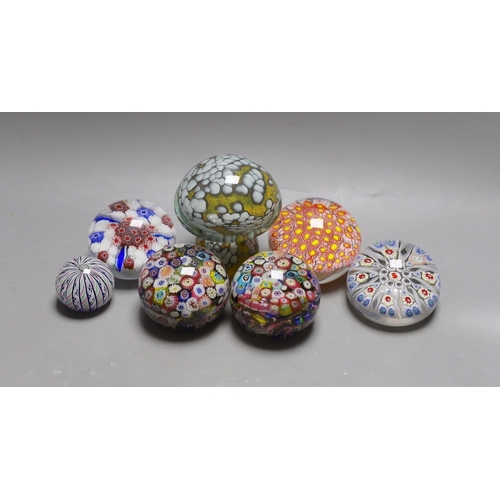 354 - A selection of seven art glass paperweights