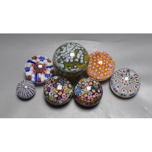 354 - A selection of seven art glass paperweights