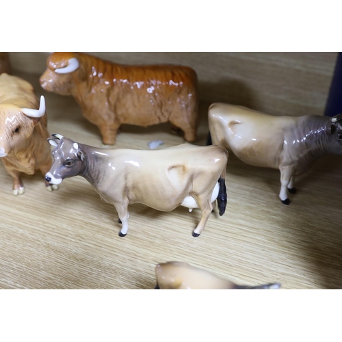 358 - A Beswick Highland bull, cow and calf, a similar Freisian bull, cow and calf and a Dulsby Coy Boy, b... 