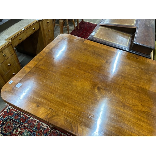 37 - A Regency banded mahogany rectangular tilt top dining table, length 141cm, depth 106cm, height 75cm... 