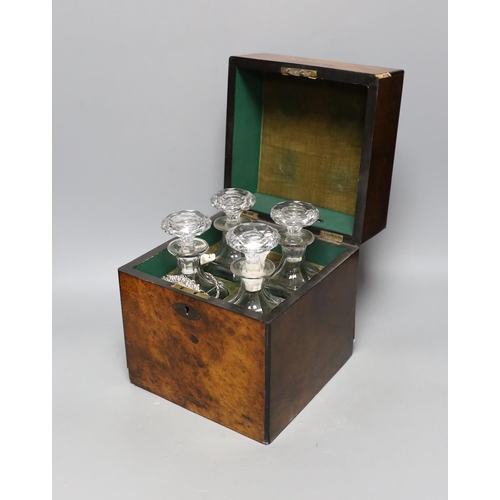 374 - A Victorian burr walnut 4 bottle decanter box, four glass decanters and a silver port label, 24cm ... 