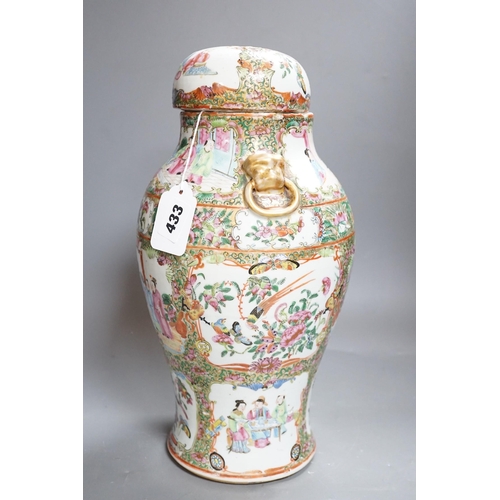 377 - A 19th century Cantonese famille rose baluster vase and cover, the latter lacking a knop finial, 38c... 