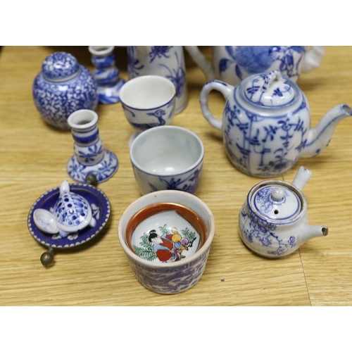 382 - A collection of mostly Japanese blue and white ceramics, late 19th/early 20th century, including a S... 