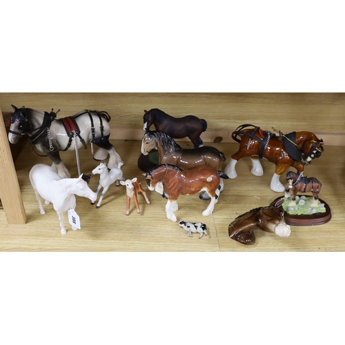 388 - A collection of mixed Beswick, horses, to include cart horses a wall pocket, white glazed horse and ... 