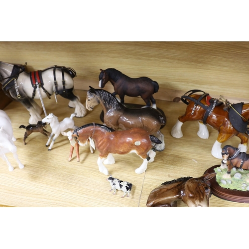 388 - A collection of mixed Beswick, horses, to include cart horses a wall pocket, white glazed horse and ... 