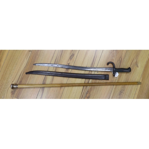 389 - A silver mounted malacca walking cane together with a 19th century French bayonet