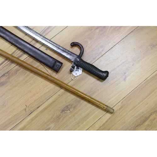 389 - A silver mounted malacca walking cane together with a 19th century French bayonet