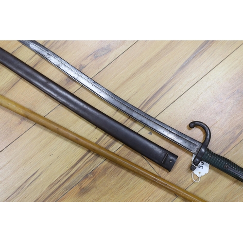 389 - A silver mounted malacca walking cane together with a 19th century French bayonet