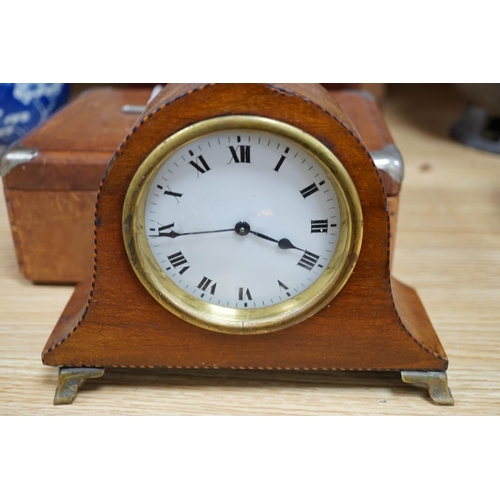 390 - A 19th century mahogany tea caddy, writing slope, leather box and mantel clock, largest 30cm wide... 