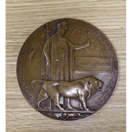 392 - A framed World War One memorial to Pte. G J Foster, London Regiment, and a Memorial plaque to Albert... 