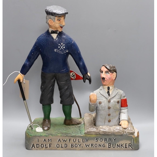 402 - A carved and painted wood anti-Hitler caricature group, 47cm high