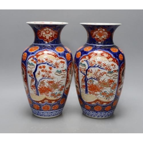 408 - A pair of Japanese Imari vases, Meiji period. 30cm tall