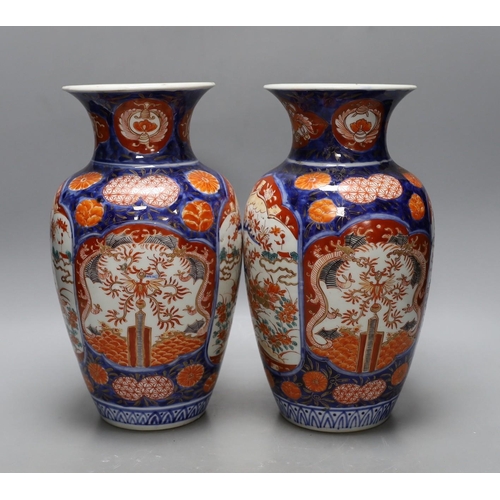 408 - A pair of Japanese Imari vases, Meiji period. 30cm tall