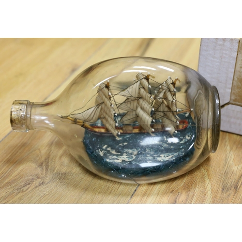 414 - A silver plated meat dome, brass and copper measures, ship in a bottle, mixed collectables