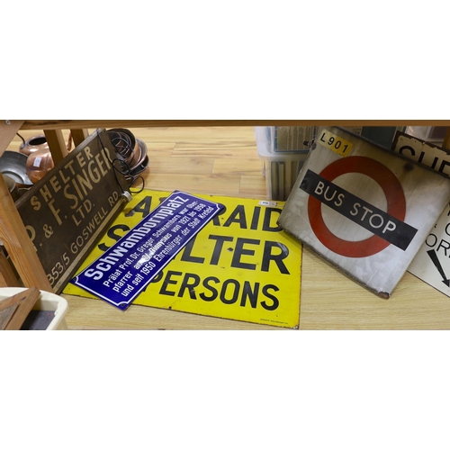 416 - An Air Raid Shelter enamel sign, 61 x 77cm, and four other signs