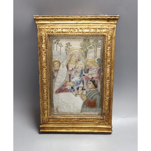 424 - A silk thread embroidery of the 'Madonna of Peace', 36x24cm including gilt frame