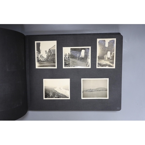 426 - An English photograph album with photos of a holiday to Germany in August 1936.