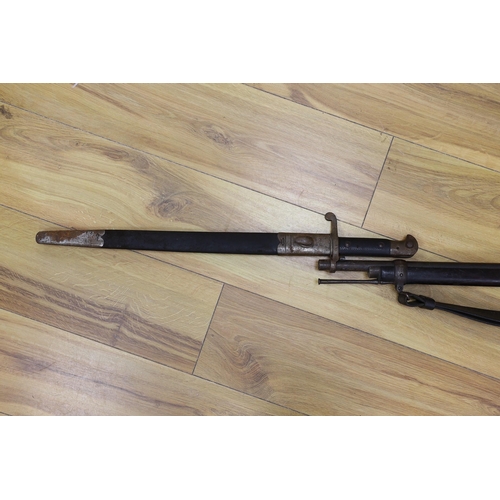 430 - An Enfield breech loading .577 calibre rifle dated 1886, with Wilkinson bayonet and sheathe