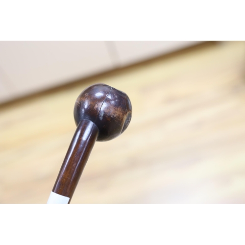 433 - An African Knobkerrie/throwing club 70cm